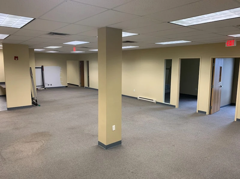 A clean, empty commercial office space in Jersey City, North New Jersey after JunkDoctors removed cubicles and office furniture.