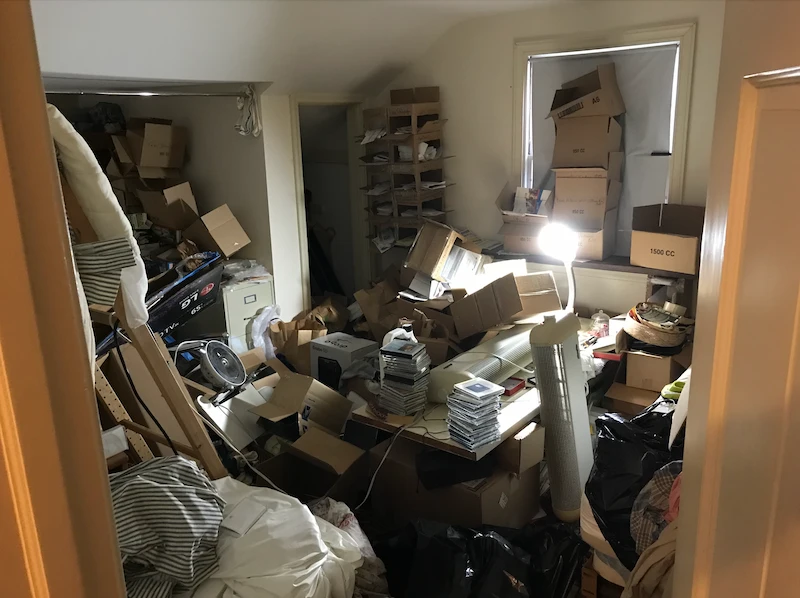 A North Jersey home filled with belongings before JunkDoctors performed a last-minute emergency cleanout.