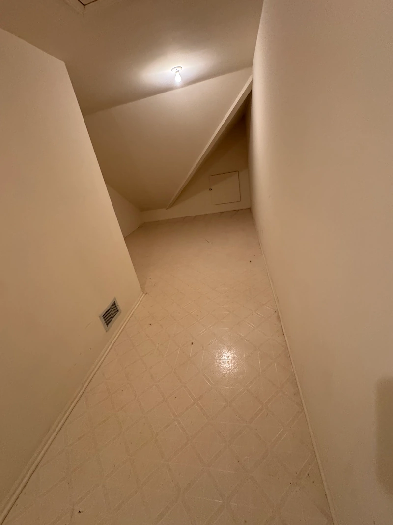 A residential attic space in Basking Ridge, North Jersey completely cleared of junk and stored items after a JunkDoctors cleanout.