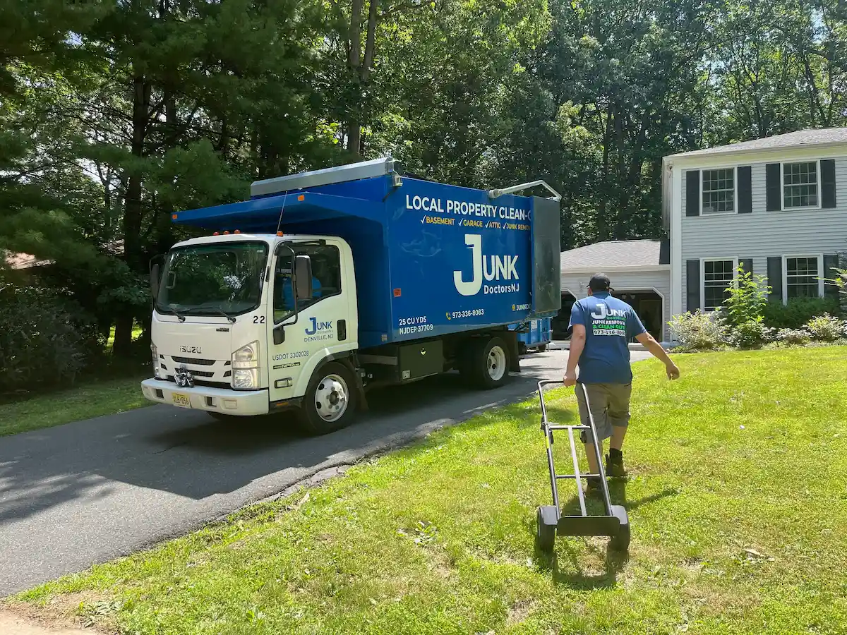 JunkDoctors residential junk cleanout truck loaded with furniture and household items during a New Jersey removal service.