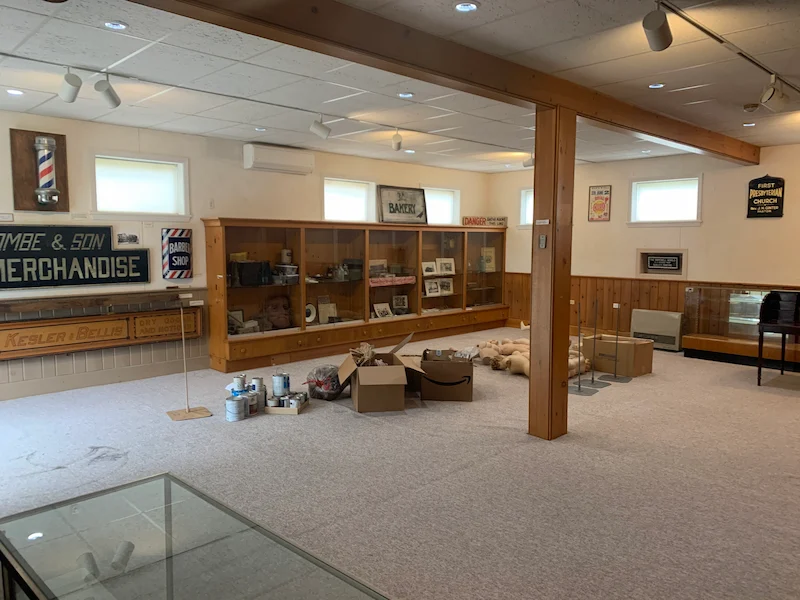 Before and after of a store cleanout featuring the removal of mannequins, old displays, and retail boxes to clear out the space.